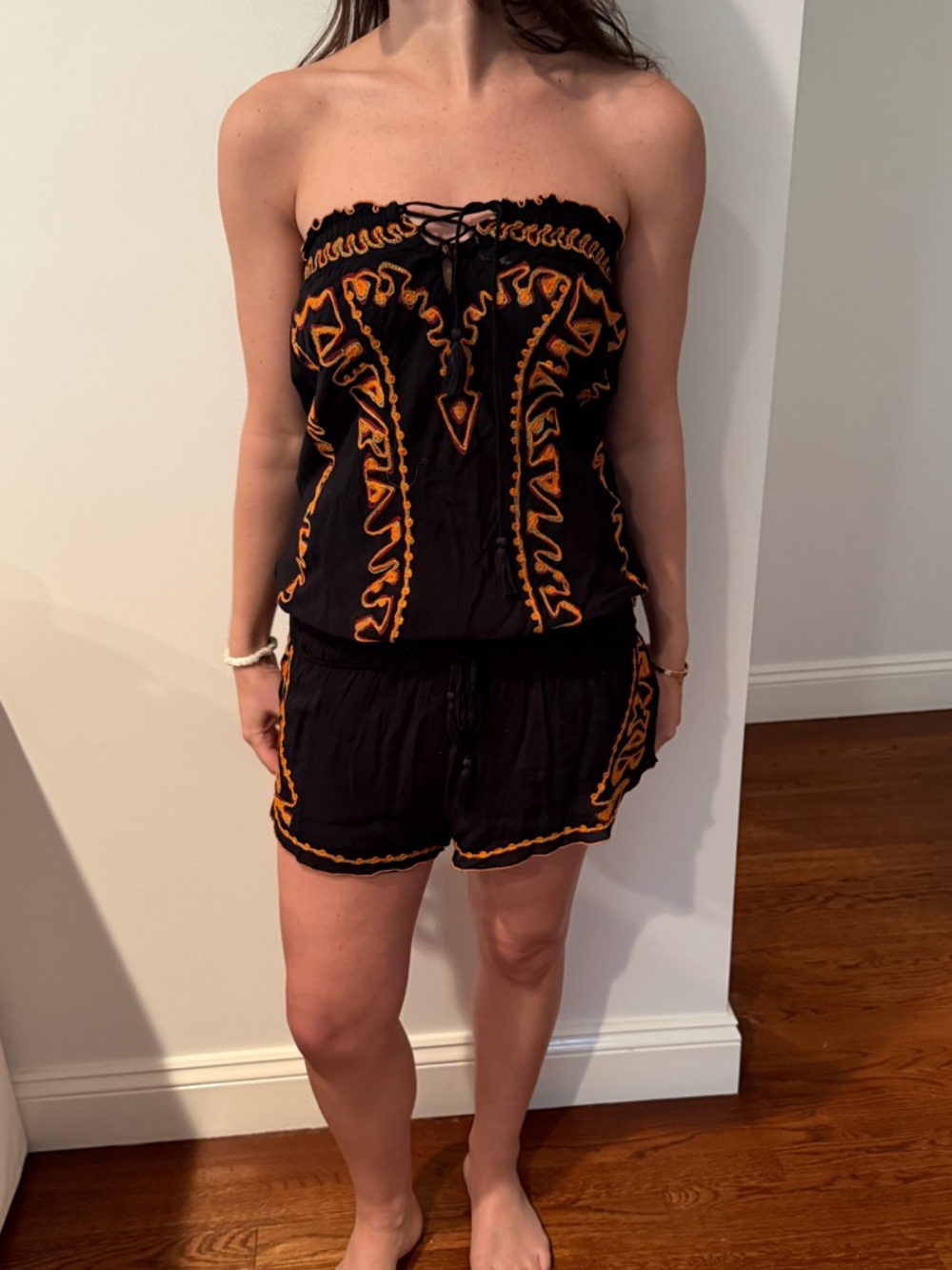 Poupette St. Barth Black Strapless Romper with Orange Embroidery